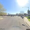 Officer checks parked vehicle on Mayfair Drive