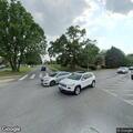 Female patient receiving medical care at Baltimore intersection