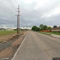Traffic stop on red Nissan Rogue in Eaton