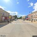 Disabled vehicle with blown tire on West State Street