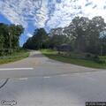 Pickup reported throwing items at passing cars