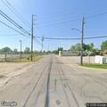 Two vehicles blocking roadway on Maple Street