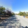 High-end cars racing near Haas Drive and Oak Hill