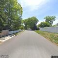 Commercial van drives onto front lawn