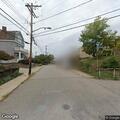 Man shouting and hitting red car on Reese Street