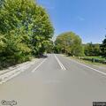 Person found lying in grass on Bridge Street