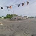 Tree falls onto vehicle at highway intersection