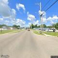 Gray SUV driving into oncoming traffic in Mendon