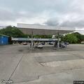 Police disturbance at store, ambulance requested