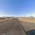 Semi and car crash with fluid leak in Watford City