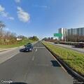 Person with breathing trouble in red Tesla at Columbia Pike