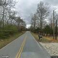 Tree blocking roadway on Quick Road near county line