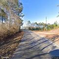 Four-acre smoldering pine plantation fire