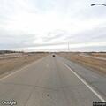 Open trunk on SUV with unsecured items on highway