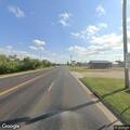 Deer reported at stop sign on 10th Street SW