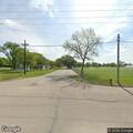Car crashes into light pole by soccer fields