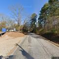 Two vehicles crash off road and hit tree