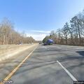 Flatbed truck with trailer blocking lane on I-85