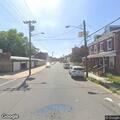 Person experiencing abdominal pain at intersection in Trenton
