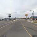 Woman in white top falls in roadway at Kingshighway