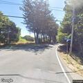 Man walking near roadway on San Geronimo Valley Drive