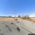 Vehicle speeding on freshly paved county roadway