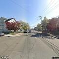 Traffic stop on silver Cadillac sedan