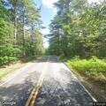 Pedestrian walking in roadway on South Clary Road