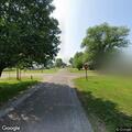 Person seen waving handgun in yard on South Walnut