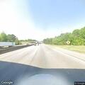 Person foaming at mouth unconscious in vehicle on highway