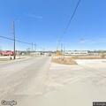 Woman yelling at intersection near auction house