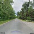 Tree hanging into road on West Brookfield Road
