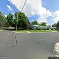 Traffic stop of black sedan on Maple Avenue