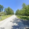 Downed power poles and lines block West Division Road