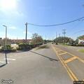 Traffic stop on orange Ford pickup truck