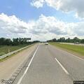 Officer assists driver with flat tire on I-69
