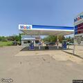 Reckless unlicensed driving at gas station