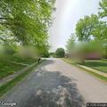 Man found lying half on sidewalk and roadway waiting ride