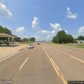 Dead deer in median creating traffic hazard