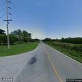 Traffic stop on red Ford Taurus in Valier