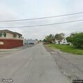 Power line hanging over road after pole snaps