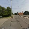 Loose dog in roadway at 2nd and Baumey