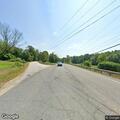 Disabled car after wheel comes off on Route 122