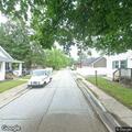 Tree limb with power lines blocking Maple Grove road