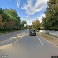 Delivery truck damages front lawn on Grove Street