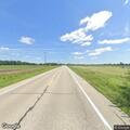 Traffic stop on black Yukon on Highway 59