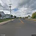 Dump truck hits utility pole, wire left hanging