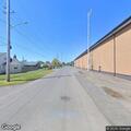 Officer detains three people in alley