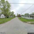 Loose aggressive dog reported at intersection