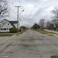 Low-hanging utility line reported near sidewalk
